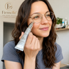 Firmelle™ Eye Cream being applied under the eye