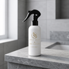 Sole MIST™ Exfoliating Foot Spray being sprayed on feet