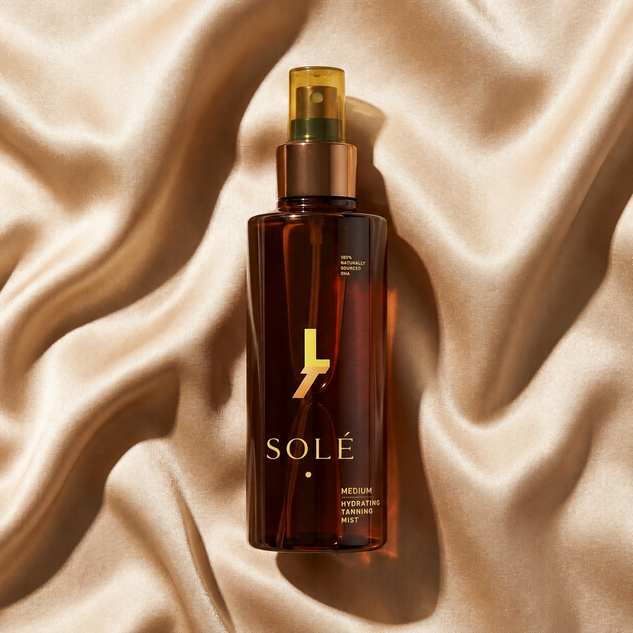 Solé™ Self Tanning Mist being sprayed on legs