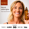 Solé™ Self Tanning Mist held in hand