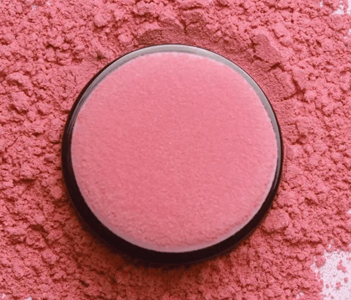 Veloura™ Powder Blush Set with a single rosy pink pressed-powder pan in a round black compact