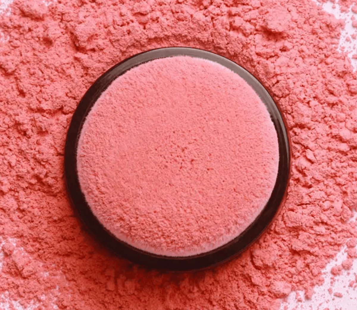 Veloura™ Powder Blush Set featuring a single round compact of pressed powder in a textured soft pink shade